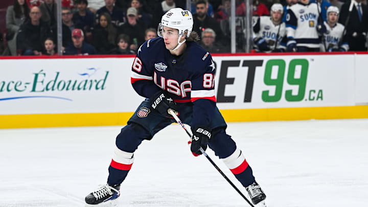 Feb 13, 2025; Montreal, Quebec, CAN; [Imagn Images direct customers only] Team USA forward Jack Hughes (86) plays the puck against Team Finland in the first period during a 4 Nations Face-Off ice hockey game at Bell Centre. Mandatory Credit: David Kirouac-Imagn Images