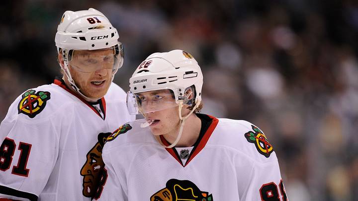 Mar 16, 2012; Dallas, TX, USA; Chicago Blackhawks right wing Marian Hossa (81) and right wing Patrick Kane (88) talk during the third period against the Dallas Stars at the American Airlines Center. The Blackhawks defeated the Stars 4-1. Mandatory Credit: Jerome Miron-USA TODAY Sports