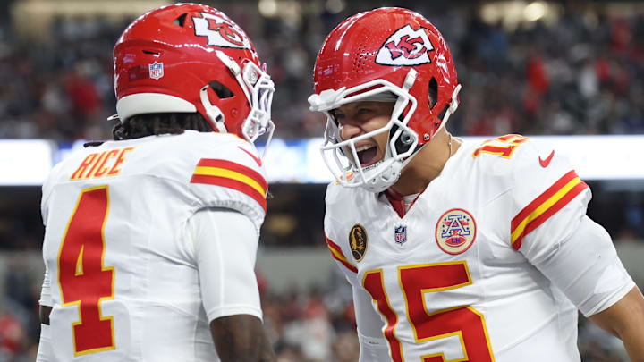 Nov 27, 2025; Arlington, Texas, USA; Kansas City Chiefs wide receiver Rashee Rice (4) and Kansas City Chiefs quarterback Patrick Mahomes (15) celebrate after a play against the Dallas Cowboys during the first quarter at AT&T Stadium. Mandatory Credit: Kevin Jairaj-Imagn Images