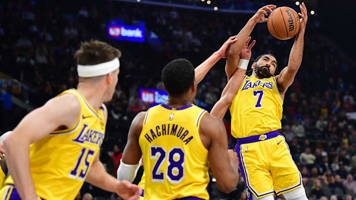 Los Angeles Lakers guard Gabe Vincent (7) plays for the rebound against the Los Angeles Clippers during the first half at Intuit Dome.