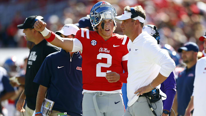 Mississippi Rebels quarterback Jaxson Dart (2) talks with head coach Lane Kiffin last season. Mississippi Rebels quarterback Jaxson Dart (2) talks with head coach Lane Kiffin last season.