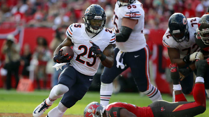 Dec 27, 2015; Tampa, FL, USA; Chicago Bears running back Ka'Deem Carey (25) runs with the ball against the Tampa Bay Buccaneers during the second half at Raymond James Stadium. Chicago Bears defeated the Tampa Bay Buccaneers 26-21.