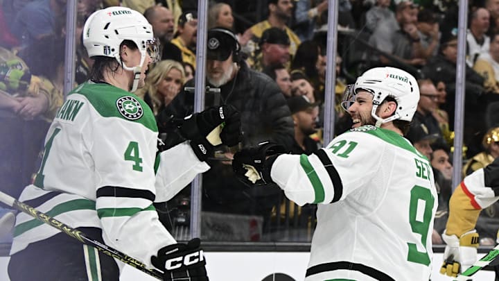 Apr 27, 2024; Las Vegas, Nevada, USA; Dallas Stars defenseman Miro Heiskanen (4) celebrates his second-period goal with center Tyler Seguin (91) against the Vegas Golden Knights in game three of the first round of the 2024 Stanley Cup Playoffs at T-Mobile Arena. Mandatory Credit: Candice Ward-Imagn Images