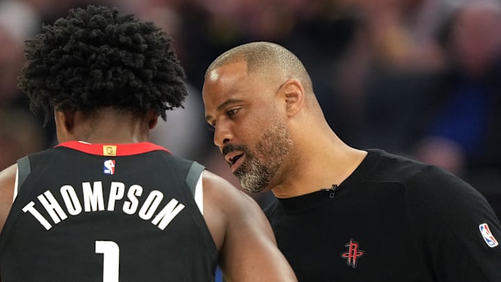 Apr 26, 2025; San Francisco, California, USA; Houston Rockets head coach Ime Udoka (right) talks with forward Amen Thompson (1) during the second quarter of game three of first round for the 2024 NBA Playoffs against the Golden State Warriors at Chase Center. Mandatory Credit: Darren Yamashita-Imagn Images