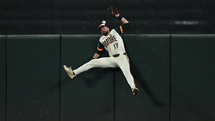Jul 10, 2026; Baltimore, Maryland, USA; Baltimore Orioles outfielder Colton Cowser (17) crashes into the center field wall as he tries unsuccessfully to catch a home run ball hit by Kansas City outfielder Isaac Collins (1) in the eighth inning at Oriole Park at Camden Yards. Mandatory Credit: Jamie Sabau-Imagn Images Jul 10, 2026; Baltimore, Maryland, USA; Baltimore Orioles outfielder Colton Cowser (17) crashes into the center field wall as he tries unsuccessfully to catch a home run ball hit by Kansas City outfielder Isaac Collins (1) in the eighth inning at Oriole Park at Camden Yards. Mandatory Credit: Jamie Sabau-Imagn Images