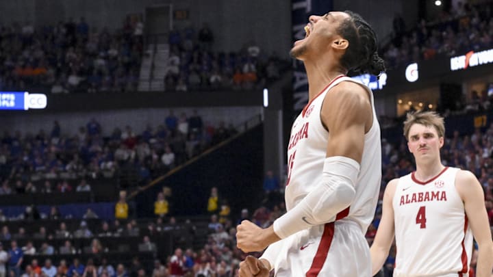 Mar 14, 2025; Nashville, TN, USA;  Alabama Crimson Tide forward Jarin Stevenson (15) celebrates the basket against the Kentucky Wildcats during the first half at Bridgestone Arena. Mandatory Credit: Steve Roberts-Imagn Images