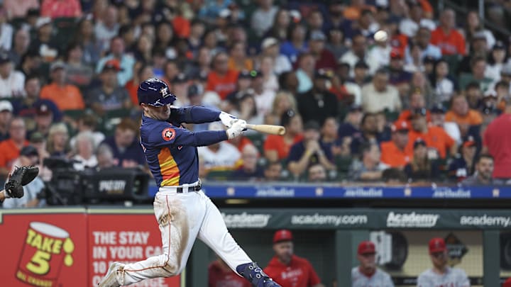 Sep 22, 2024; Houston, Texas, USA; Houston Astros third baseman Alex Bregman (2) hits a home run during the fifth inning against the Los Angeles Angels at Minute Maid Park.