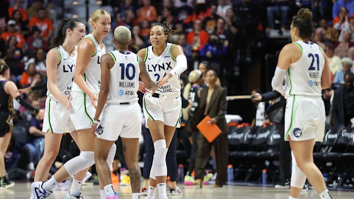 Minnesota Lynx forward Napheesa Collier (24) celebrates with teammates.