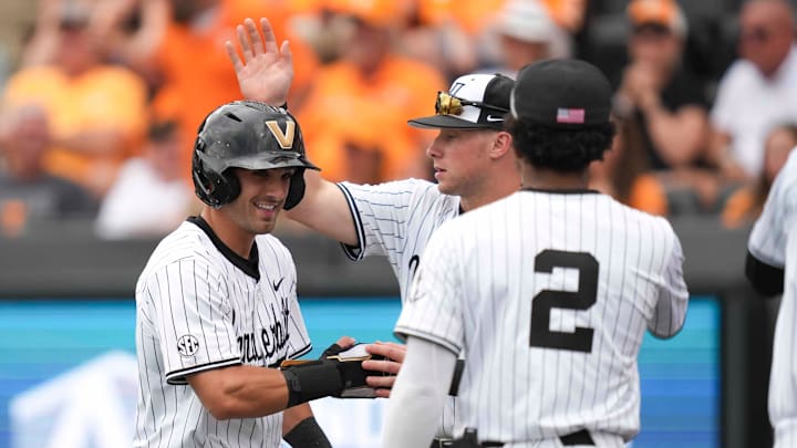 Vanderbilt infielder Mike Mancini (5) celebrates after scoring a run during a NCAA baseball game between the Tennessee Volunteers and Vanderbilt Commodores at Lindsey Nelson Stadium on May 11, 2025. Vanderbilt infielder Mike Mancini (5) celebrates after scoring a run during a NCAA baseball game between the Tennessee Volunteers and Vanderbilt Commodores at Lindsey Nelson Stadium on May 11, 2025.