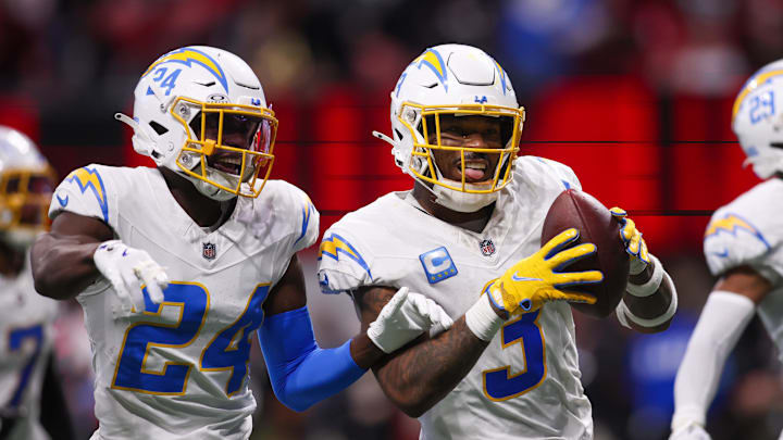 Dec 1, 2024; Atlanta, Georgia, USA; Los Angeles Chargers safety Derwin James Jr. (3) celebrates with safety Marcus Maye (24) and cornerback Tarheeb Still (29) after an interception against the Atlanta Falcons in the fourth quarter at Mercedes-Benz Stadium. Mandatory Credit: Brett Davis-Imagn Images