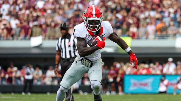 Nov 8, 2025; Starkville, Mississippi, USA; Georgia Bulldogs wide receiver Zachariah Branch (1) runs for a touchdown against the Mississippi State Bulldogs during the first half at Davis Wade Stadium at Scott Field. Mandatory Credit: Wesley Hale-Imagn Images