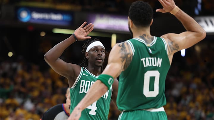May 25, 2024; Indianapolis, Indiana, USA; Boston Celtics guard Jrue Holiday (4) celebrates with forward Jayson Tatum (0) after drawing a foul against the Indiana Pacers in the closing seconds of the fourth quarter of game three of the eastern conference finals in the 2024 NBA playoffs at Gainbridge Fieldhouse. Mandatory Credit: Trevor Ruszkowski-Imagn Images