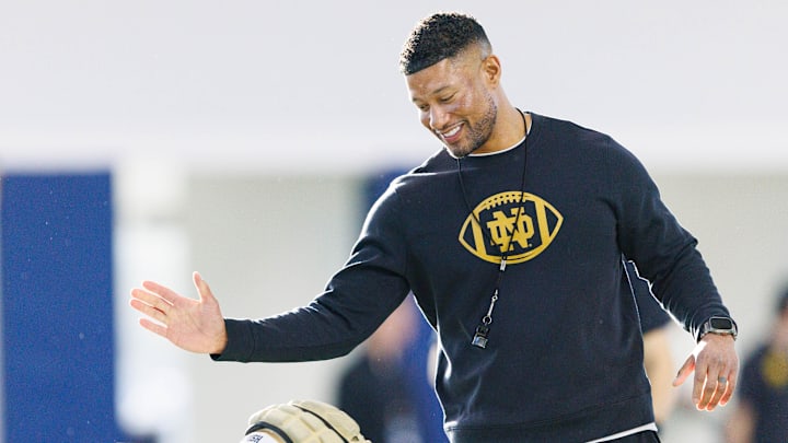 Notre Dame head coach Marcus Freeman greets his players during a Notre Dame football spring practice at Irish Athletic Center on Wednesday, March 19, 2025, in South Bend.