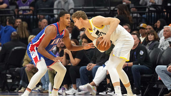 Nov 16, 2024; Sacramento, California, USA; Sacramento Kings forward Keegan Murray (left) defends against Utah Jazz forward Lauri Markkanen (right) during the first quarter at Golden 1 Center. Mandatory Credit: Darren Yamashita-Imagn Images