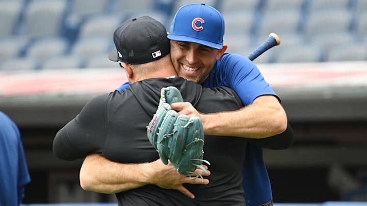 Apr 3, 2026: Cleveland Guardians manager Stephen Vogt hugs Chicago Cubs starting pitcher Matthew Boyd (16) during batting practice before the game between the Guardians and the Cubs at Progressive Field. 
