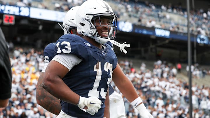 Penn State Nittany Lions running back Kaytron Allen (13) reacts after scoring a touchdown during the fourth quarter against the Florida International Panthers at Beaver Stadium. 