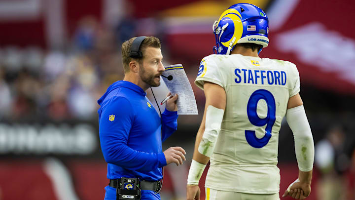 Nov 26, 2023; Glendale, Arizona, USA; Los Angeles Rams head coach Sean McVay talks with quarterback Matthew Stafford (9) against the Arizona Cardinals at State Farm Stadium. Mandatory Credit: Mark J. Rebilas-USA TODAY Sports