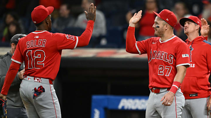 May 30, 2025; Cleveland, Ohio, USA; Los Angeles Angels right fielder Jorge Soler (12) and designated hitter Mike Trout (27) celebrate after the Angels beat the Cleveland Guardians at Progressive Field. Mandatory Credit: Ken Blaze-Imagn Images May 30, 2025; Cleveland, Ohio, USA; Los Angeles Angels right fielder Jorge Soler (12) and designated hitter Mike Trout (27) celebrate after the Angels beat the Cleveland Guardians at Progressive Field. Mandatory Credit: Ken Blaze-Imagn Images