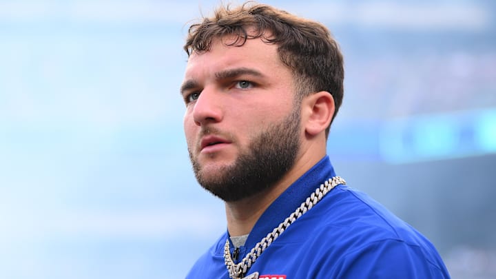 Aug 16, 2025; East Rutherford, New Jersey, USA; New York Giants running back Cam Skattebo (44) walks on the field prior to a game against the New York Jets at MetLife Stadium. 