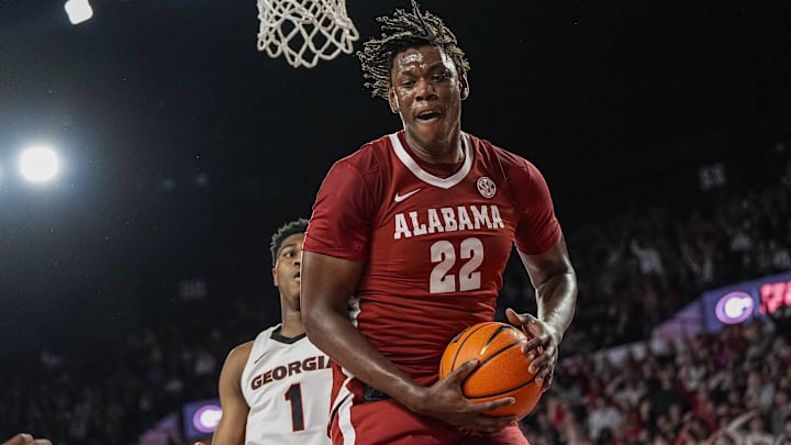 Mar 3, 2026; Athens, Georgia, USA; Alabama Crimson Tide forward Aiden Sherrell (22) grabs a rebound against the Georgia Bulldogs at Stegeman Coliseum. Mandatory Credit: Dale Zanine-Imagn Images