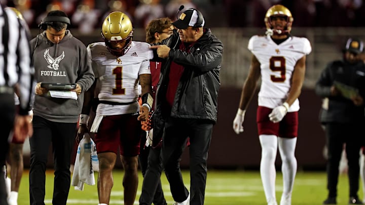 Oct 17, 2024; Blacksburg, Virginia, USA; Boston College Eagles head coach Bill O'Brien talks to quarterback Thomas Castellanos (1) during the second quarter against the Virginia Tech Hokies at Lane Stadium. Mandatory Credit: Peter Casey-Imagn Images Oct 17, 2024; Blacksburg, Virginia, USA; Boston College Eagles head coach Bill O'Brien talks to quarterback Thomas Castellanos (1) during the second quarter against the Virginia Tech Hokies at Lane Stadium. Mandatory Credit: Peter Casey-Imagn Images