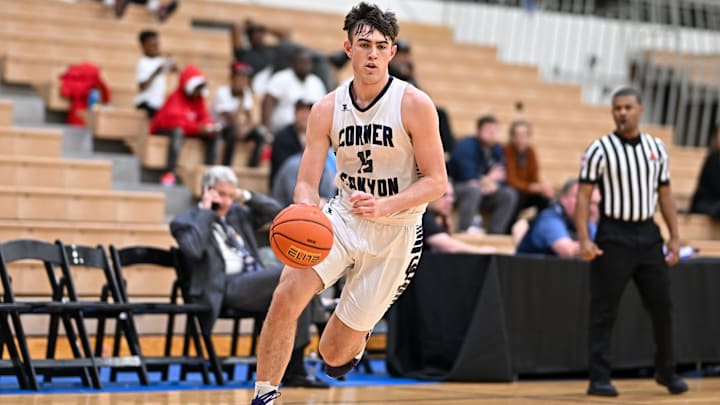 Brody Kozlowski drives to the hoop in a game for Corner Canyon High School