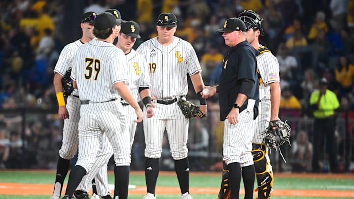 Southern Miss Golden Eagles head coach Christian Ostrander makes a pitching change during the game against the Mississippi State Bulldogs at Pete Taylor Park in Hattiesburg, Miss., on March 3, 2026.