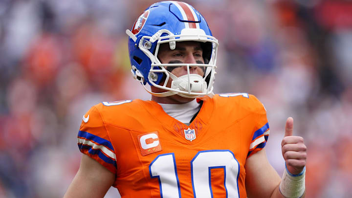 Oct 26, 2025; Denver, Colorado, USA; Denver Broncos quarterback Bo Nix (10) reacts in the first quarter against the Dallas Cowboys at Empower Field at Mile High. 