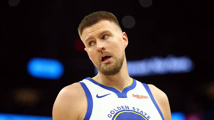 Apr 17, 2026; Phoenix, Arizona, USA; Golden State Warriors center Kristaps Porzingis (7) against the Phoenix Suns during the play-in rounds of the 2026 NBA Playoffs at Mortgage Matchup Center. Mandatory Credit: Mark J. Rebilas-Imagn Images