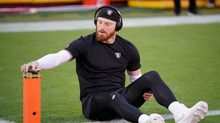 Oct 19, 2025; Kansas City, Missouri, USA; Las Vegas Raiders defensive end Maxx Crosby (98) stretches during warmups prior to the game against the Kansas City Chiefs at GEHA Field at Arrowhead Stadium. Mandatory Credit: Denny Medley-Imagn Images