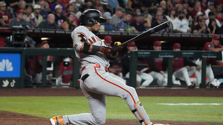 Jul 1, 2026; Phoenix, Arizona, USA; San Francisco Giants second baseman Luis Arraez (1) hits against the Arizona Diamondbacks in the fifth inning at Chase Field. Mandatory Credit: Rick Scuteri-Imagn Images