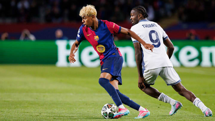 FC Barcelona winger Lamine Yamal dribbles past Inter Milan forward Marcus Thuram during the UEFA Champions League semifinal. FC Barcelona winger Lamine Yamal dribbles past Inter Milan forward Marcus Thuram during the UEFA Champions League semifinal.