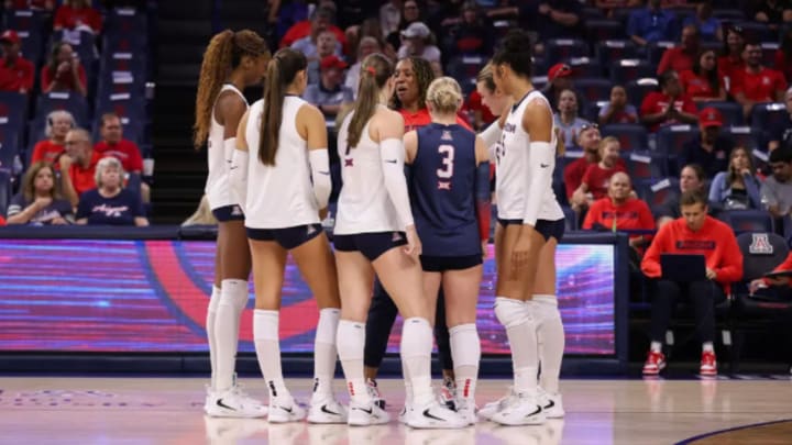 The Arizona volleyball team huddled up before a match. The Arizona volleyball team huddled up before a match.