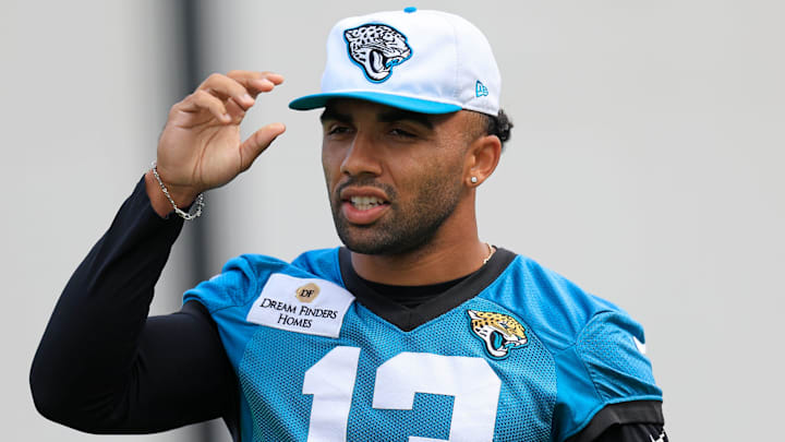 Jacksonville Jaguars wide receiver Christian Kirk (13) walks on the field during a combined NFL football training camp session between the Tampa Bay Buccaneers and Jacksonville Jaguars Wednesday, Aug. 14, 2024 at EverBank Stadium’s Miller Electric Center in Jacksonville, Fla.