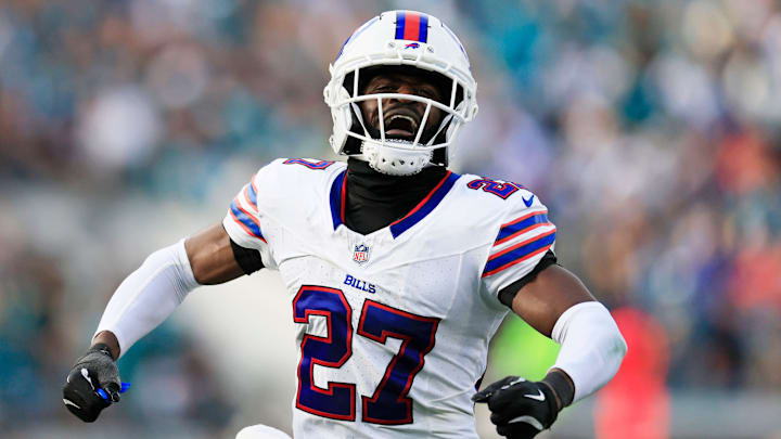 Buffalo Bills cornerback Tre'davious White (27) celebrates the game-deciding interception during the fourth quarter of an NFL football AFC Wild Card playoff matchup. Buffalo Bills cornerback Tre'davious White (27) celebrates the game-deciding interception during the fourth quarter of an NFL football AFC Wild Card playoff matchup.