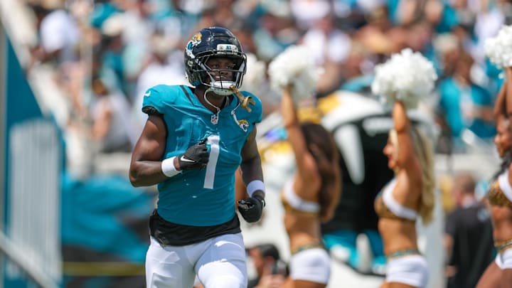 Sep 7, 2025; Jacksonville, Florida, USA; Jacksonville Jaguars running back Travis Etienne Jr. (1) takes the field prior to a game against the Carolina Panthers during the first half at EverBank Stadium. Sep 7, 2025; Jacksonville, Florida, USA; Jacksonville Jaguars running back Travis Etienne Jr. (1) takes the field prior to a game against the Carolina Panthers during the first half at EverBank Stadium.