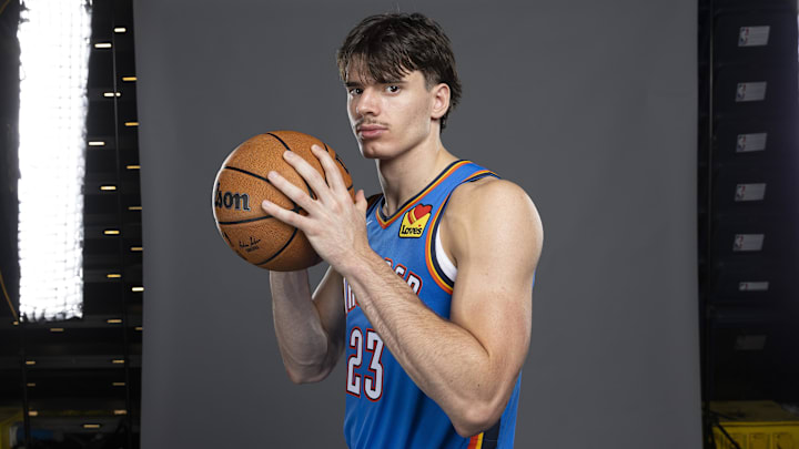 Sep 29, 2025; Oklahoma City, OK, USA; Oklahoma City Thunder forward Brooks Barnhizer (23) poses for a photo during the 2025 Oklahoma City Thunder media day at Paycom Center. Sep 29, 2025; Oklahoma City, OK, USA; Oklahoma City Thunder forward Brooks Barnhizer (23) poses for a photo during the 2025 Oklahoma City Thunder media day at Paycom Center.