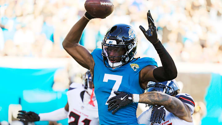 Jacksonville Jaguars wide receiver Brian Thomas Jr. (7) can’t haul in a touchdown reception against Houston Texans cornerback Derek Stingley Jr. (24), right, and safety Calen Bullock (21) during the fourth quarter of an NFL football matchup Sunday, Dec. 1, 2024 at EverBank Stadium in Jacksonville, Fla. The Texans held off the Jaguars 23-20. [Corey Perrine/Florida Times-Union]