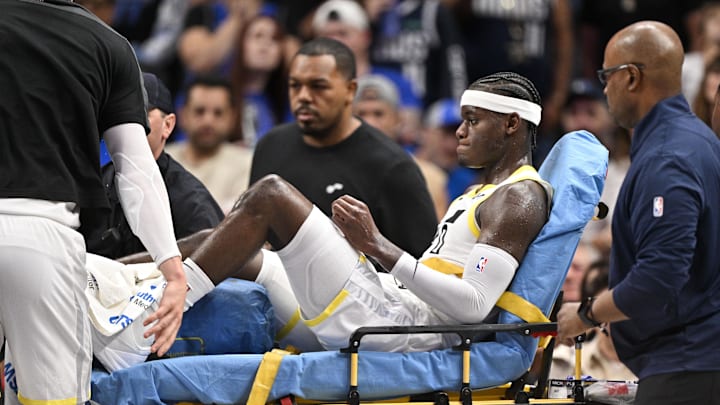 Oct 28, 2024; Dallas, Texas, USA; Utah Jazz forward Taylor Hendricks (0) is taken off the court after suffering a leg injury during the second half against the Dallas Mavericks at the American Airlines Center. Mandatory Credit: Jerome Miron-Imagn Images Oct 28, 2024; Dallas, Texas, USA; Utah Jazz forward Taylor Hendricks (0) is taken off the court after suffering a leg injury during the second half against the Dallas Mavericks at the American Airlines Center. Mandatory Credit: Jerome Miron-Imagn Images