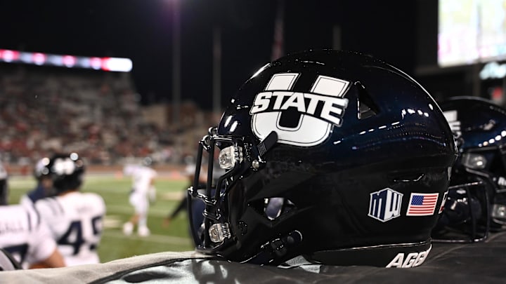Utah State Aggies helmet sits during a game against the Washington State Cougars in the second half at Gesa Field at Martin Stadium.