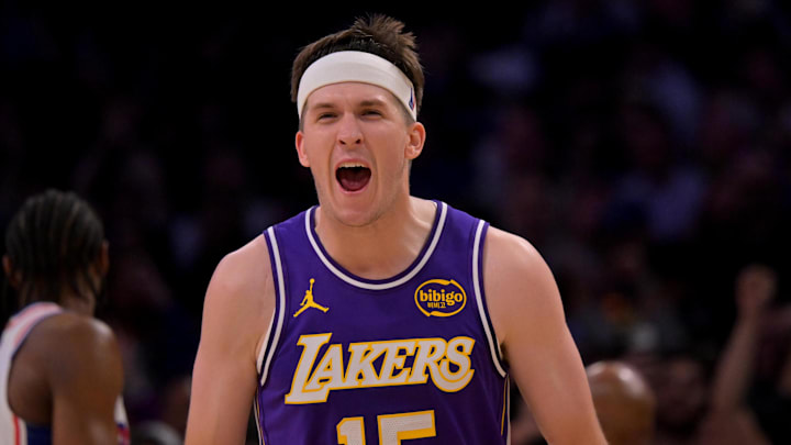 Feb 5, 2026; Los Angeles, California, USA;  Los Angeles Lakers guard Austin Reaves (15) reacts at the buzzer defeating the Philadelphia 76ers at Crypto.com Arena. Mandatory Credit: Jayne Kamin-Oncea-Imagn Images