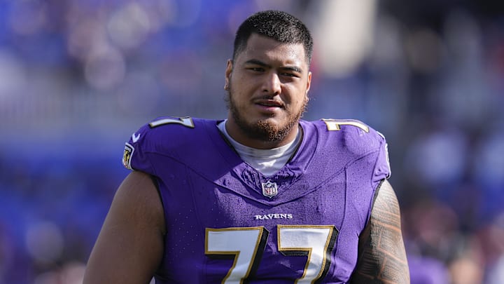 Nov 12, 2023; Baltimore, Maryland, USA;  Baltimore Ravens offensive tackle Daniel Faalele (77) looks on before a game against the Cleveland Browns at M&T Bank Stadium. Mandatory Credit: Jessica Rapfogel-USA TODAY Sports