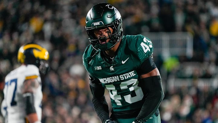 Oct 25, 2025; East Lansing, Michigan, USA; Michigan State Spartans safety Malik Spencer (43) reacts after a third down defensive play against the Michigan Wolverines during the first half at Spartan Stadium. Mandatory Credit: Brendan Mullin-Imagn Images
