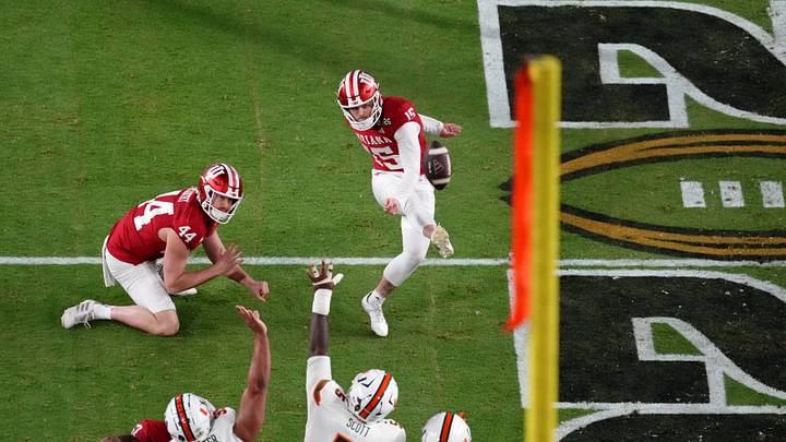 Jan 19, 2026; Miami Gardens, FL, USA; Indiana Hoosiers place kicker Nico Radicic (15) kicks a field goal against the Miami Hurricanes during the first half of the College Football Playoff National Championship game at Hard Rock Stadium. Mandatory Credit: James Lang-Imagn Images Jan 19, 2026; Miami Gardens, FL, USA; Indiana Hoosiers place kicker Nico Radicic (15) kicks a field goal against the Miami Hurricanes during the first half of the College Football Playoff National Championship game at Hard Rock Stadium. Mandatory Credit: James Lang-Imagn Images