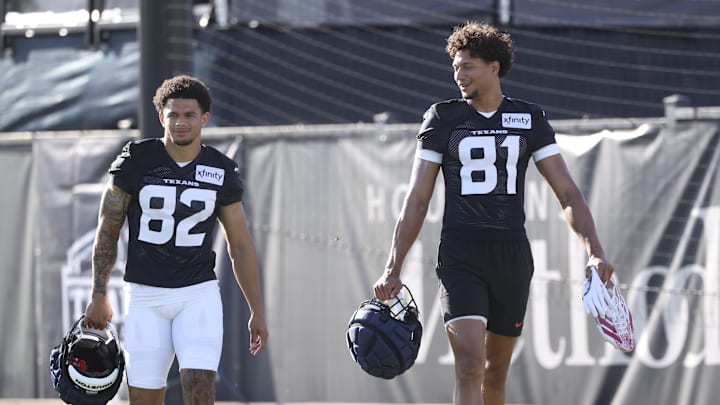 Jul 23, 2025; Houston, TX, USA; Houston Texans wide receiver Jaylin Noel (82) and wide receiver Jayden Higgins (81) during training camp at Houston Methodist Training Center. Mandatory Credit: Troy Taormina-Imagn Images Jul 23, 2025; Houston, TX, USA; Houston Texans wide receiver Jaylin Noel (82) and wide receiver Jayden Higgins (81) during training camp at Houston Methodist Training Center. Mandatory Credit: Troy Taormina-Imagn Images