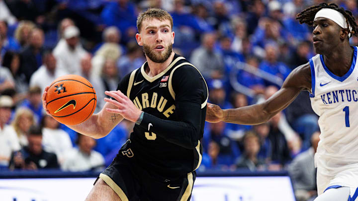 Oct 24, 2025; Lexington, KY, USA; Purdue Boilermakers guard Braden Smith (3) drives to the basket around Kentucky Wildcats guard Denzel Aberdeen (1) during the first half at Rupp Arena at Central Bank Center. Mandatory Credit: Jordan Prather-Imagn Images Oct 24, 2025; Lexington, KY, USA; Purdue Boilermakers guard Braden Smith (3) drives to the basket around Kentucky Wildcats guard Denzel Aberdeen (1) during the first half at Rupp Arena at Central Bank Center. Mandatory Credit: Jordan Prather-Imagn Images