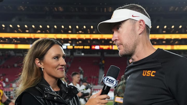 Oct 25, 2024; Los Angeles, California, USA; Southern California Trojans head coach Lincoln Riley is interviewed by FOX reporter Allison Williams after the game against the Rutgers Scarlet Knights at United Airlines Field at Los Angeles Memorial Coliseum. Mandatory Credit: Kirby Lee-Imagn Images Oct 25, 2024; Los Angeles, California, USA; Southern California Trojans head coach Lincoln Riley is interviewed by FOX reporter Allison Williams after the game against the Rutgers Scarlet Knights at United Airlines Field at Los Angeles Memorial Coliseum. Mandatory Credit: Kirby Lee-Imagn Images