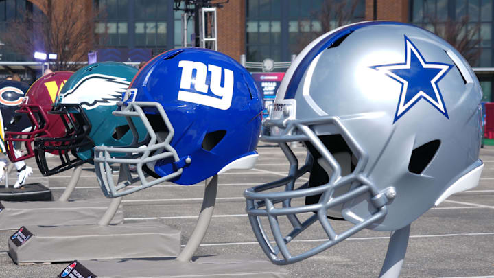 Feb 27, 2025; Indianapolis, IN, USA; NFC East helmets of the Dallas Cowboys, New York Giants, Philadelphia Eagles and Washington Commanders at the 2025 NFL Scouting Combine Experience at Lucas Oil Stadium. Mandatory Credit: Kirby Lee-Imagn Images Feb 27, 2025; Indianapolis, IN, USA; NFC East helmets of the Dallas Cowboys, New York Giants, Philadelphia Eagles and Washington Commanders at the 2025 NFL Scouting Combine Experience at Lucas Oil Stadium. Mandatory Credit: Kirby Lee-Imagn Images