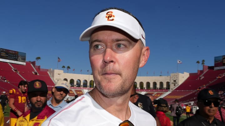 Sep 28, 2024; Los Angeles, California, USA; Southern California Trojans head coach Lincoln Riley reacts after a game against the Wisconsin Badgers at United Airlines Field at Los Angeles Memorial Coliseum. Sep 28, 2024; Los Angeles, California, USA; Southern California Trojans head coach Lincoln Riley reacts after a game against the Wisconsin Badgers at United Airlines Field at Los Angeles Memorial Coliseum.