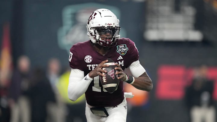 Dec 27, 2024; Las Vegas, NV, USA; Texas A&M Aggies quarterback Marcel Reed (10) throws the ball against the Southern California Trojans in the first half at Allegiant Stadium. Mandatory Credit: Kirby Lee-Imagn Images